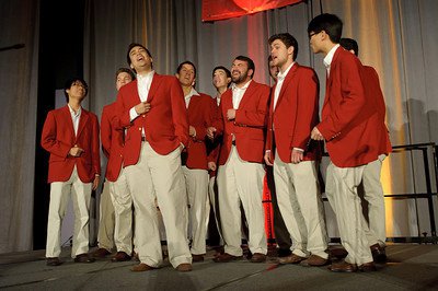The Stanford Mendicants singing in sport coats